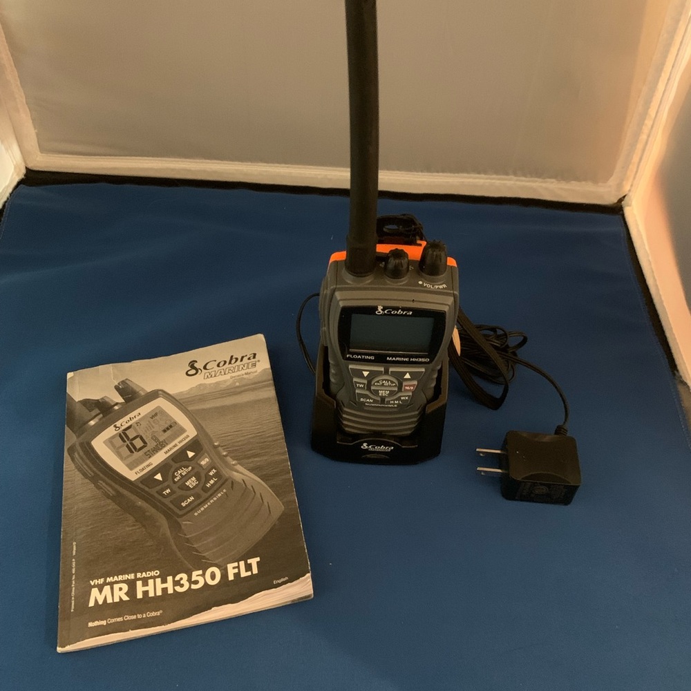 Cobra Marine Radio, MR HH350 FLT, with manual and charger.